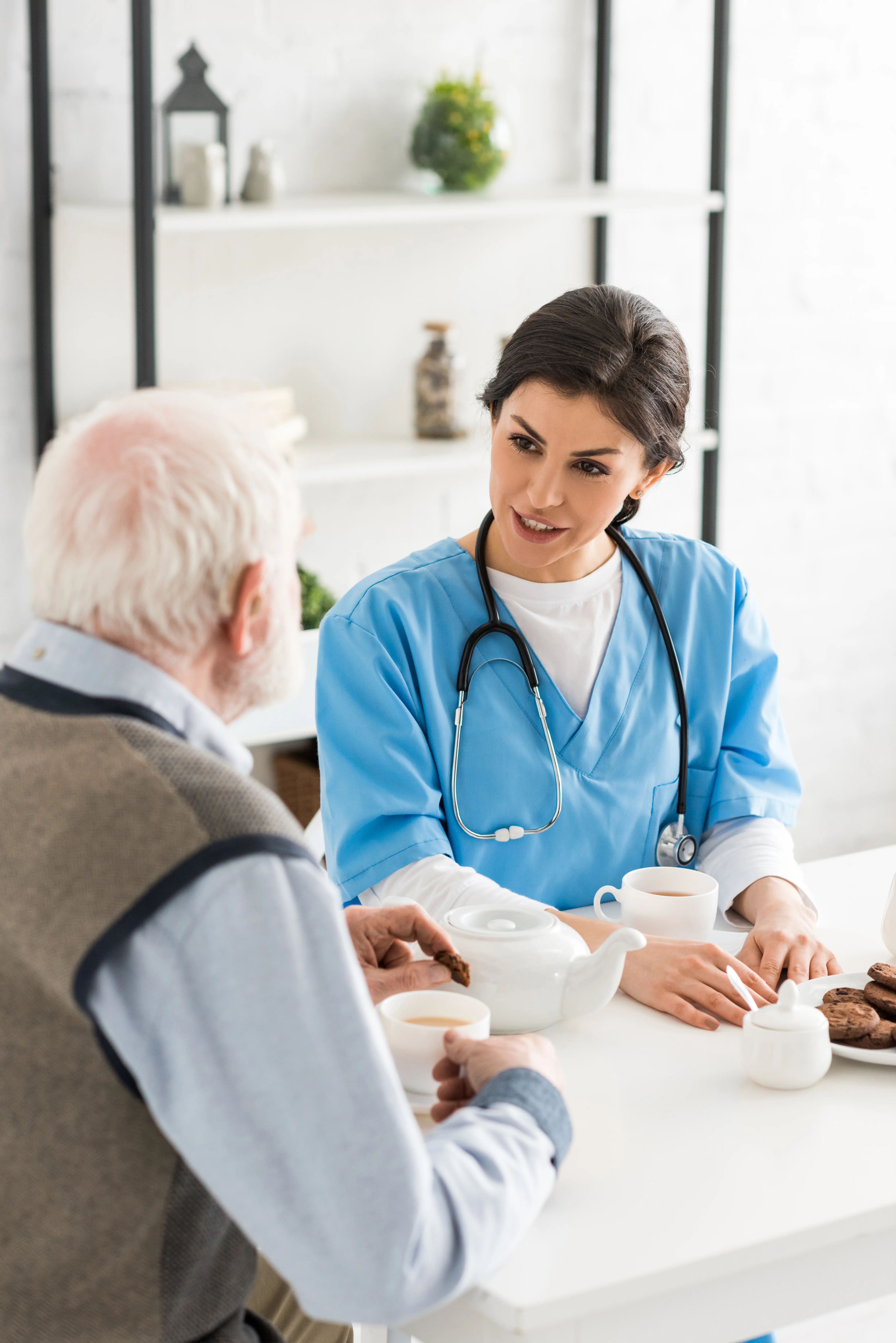 Care professional speaking with a recruitment consultant